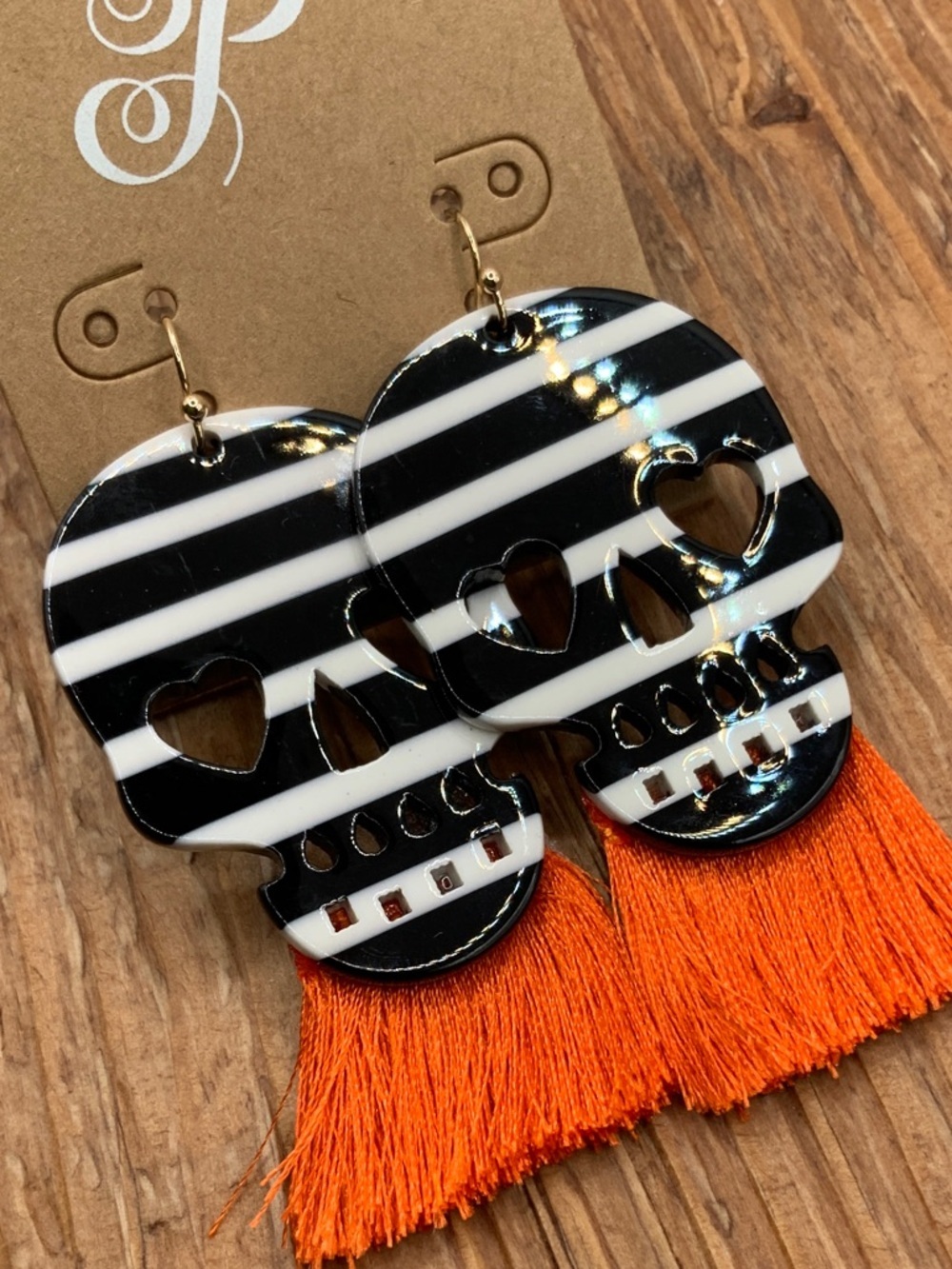 Plunder Design Black White Striped Orange Fringe Skull Drop Earrings
